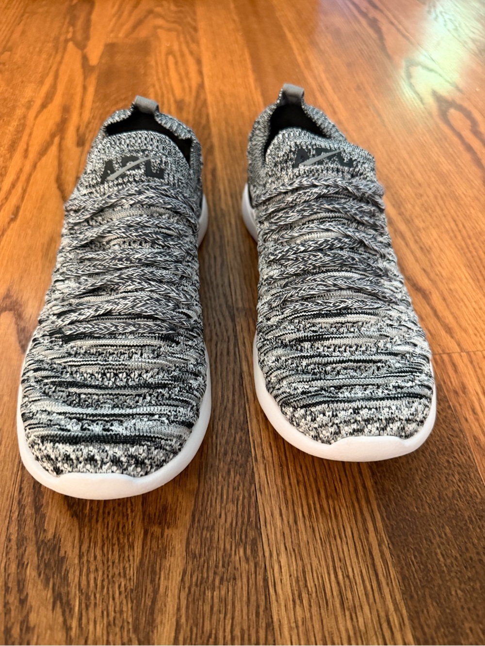 Worn once APL Women’s Knit Sneakers in Black and White
